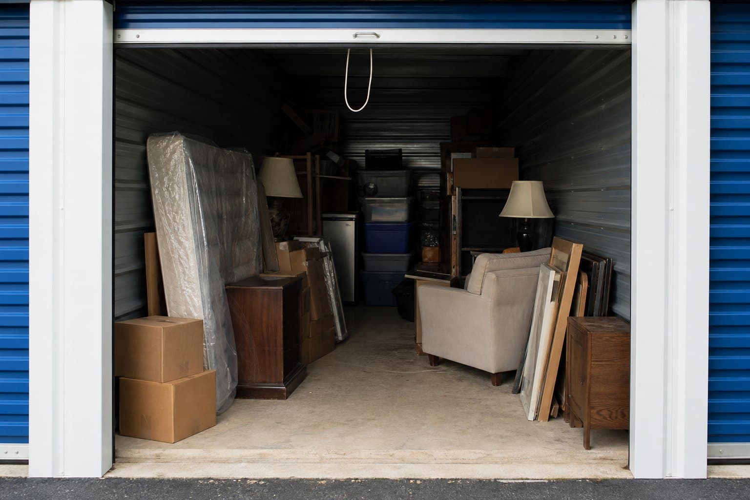 Open storage unit prepared for an online auction