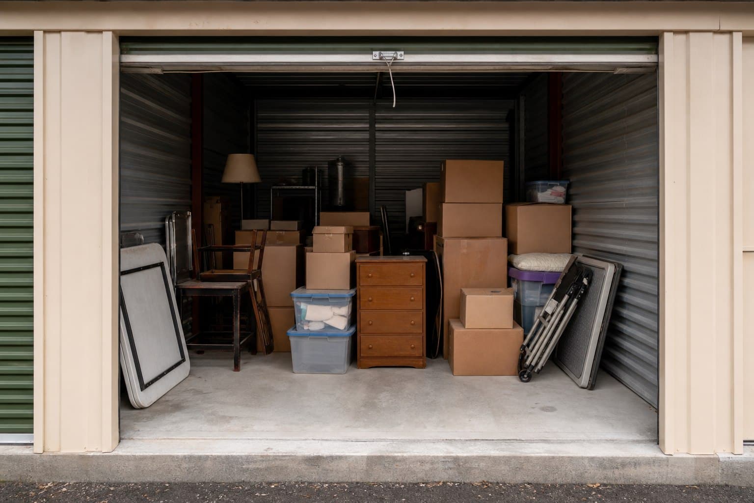 Open storage unit with household items